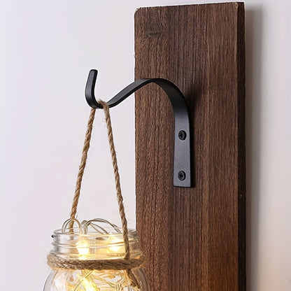 Rustic iron hooks for versatile hanging use.