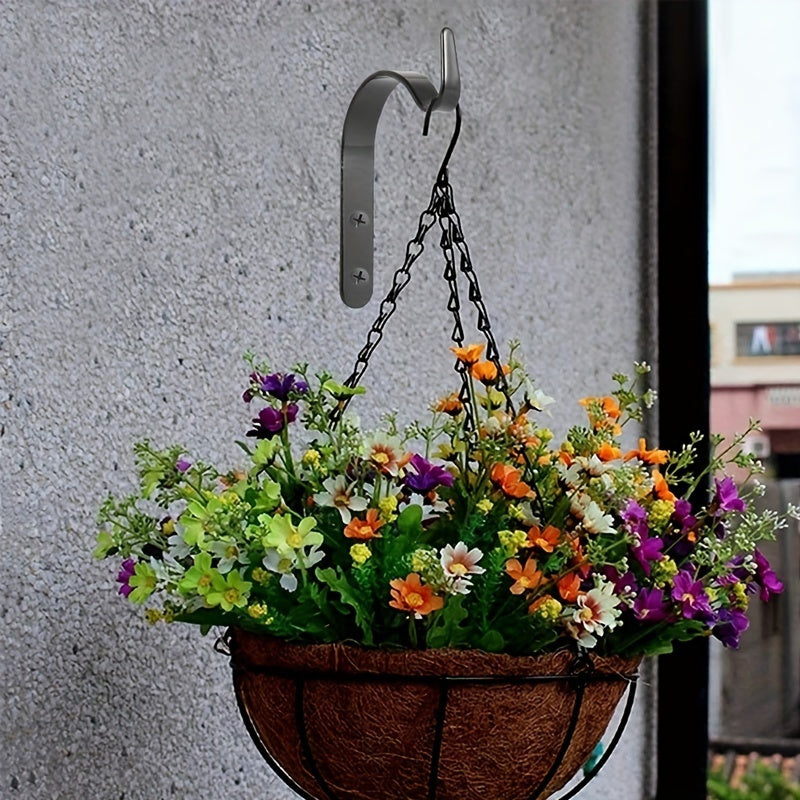 Rustic iron hooks for versatile hanging use.