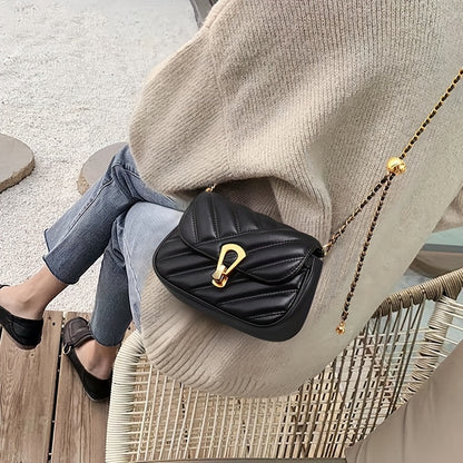 Stylish black quilted crossbody bag with golden-tone clasp, synthetic leather, perfect for casual or formal outfits, everyday elegance.