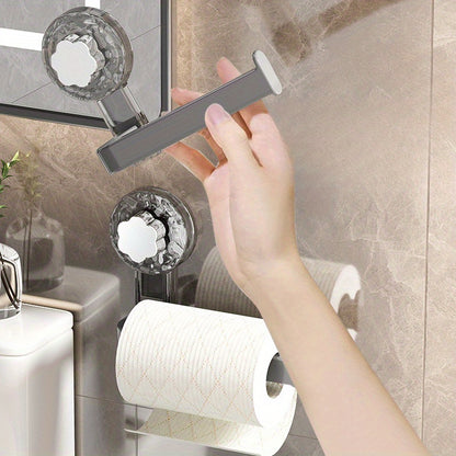 Suction cup toilet paper holder for no-drill installation. Made of plastic for kitchen and bathroom use. Can also be used as a towel organizer rack.