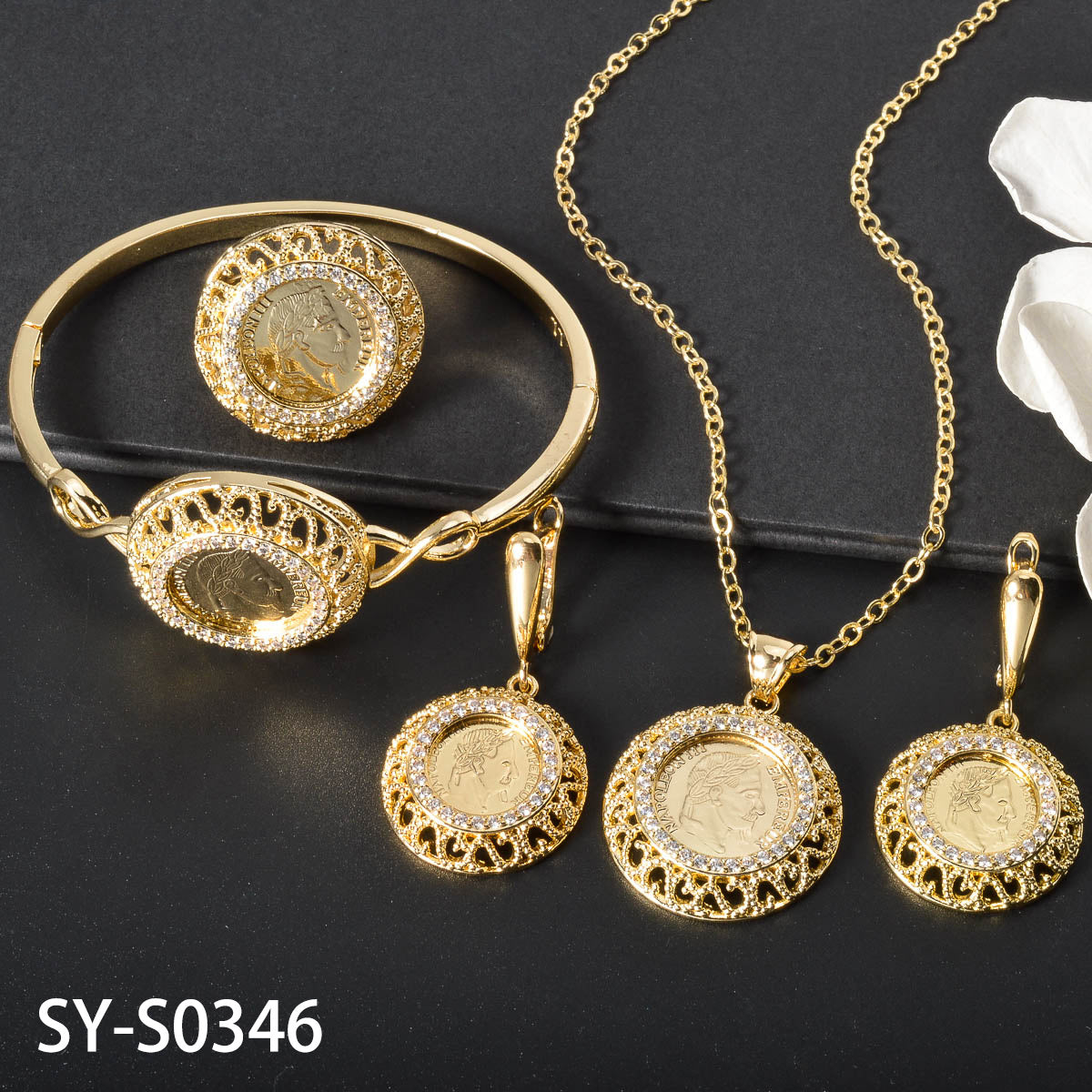 Beautiful Vintage Jewelry Set with Sparkling Synthetic Zirconia and Hollow Design, Made from Copper Material. Set includes Necklace, Earrings, Bracelet, and Ring, Ideal for Weddings and Gift Giving.