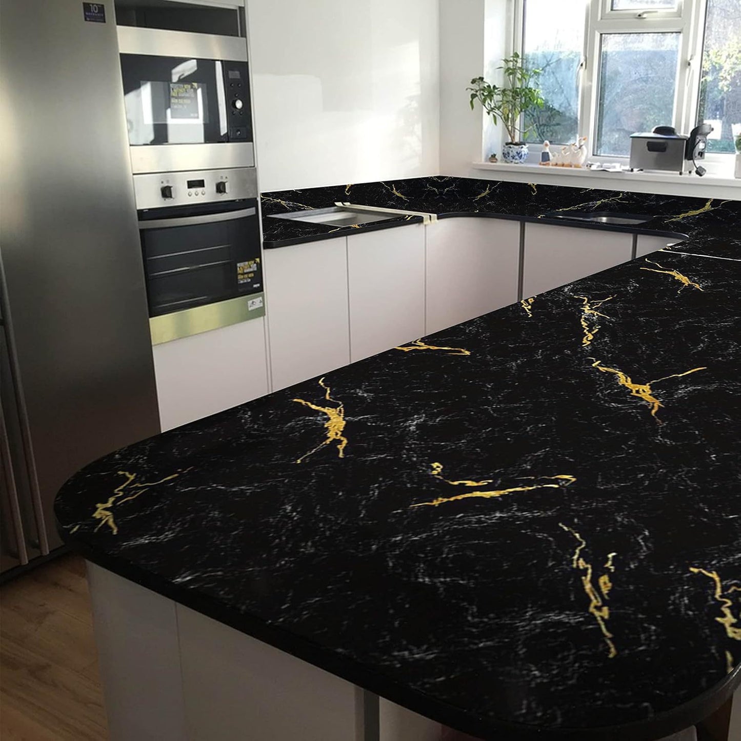 60CMx5M Black marble-look self-adhesive wallpaper roll for kitchens.