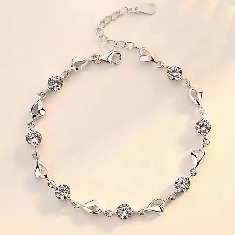 Stylish Sterling Silver Chain featuring Cubic Zirconia Hearts, suitable for any occasion - great for Christmas, weddings, parties, and gift-giving. Perfect addition to any woman's jewelry collection.