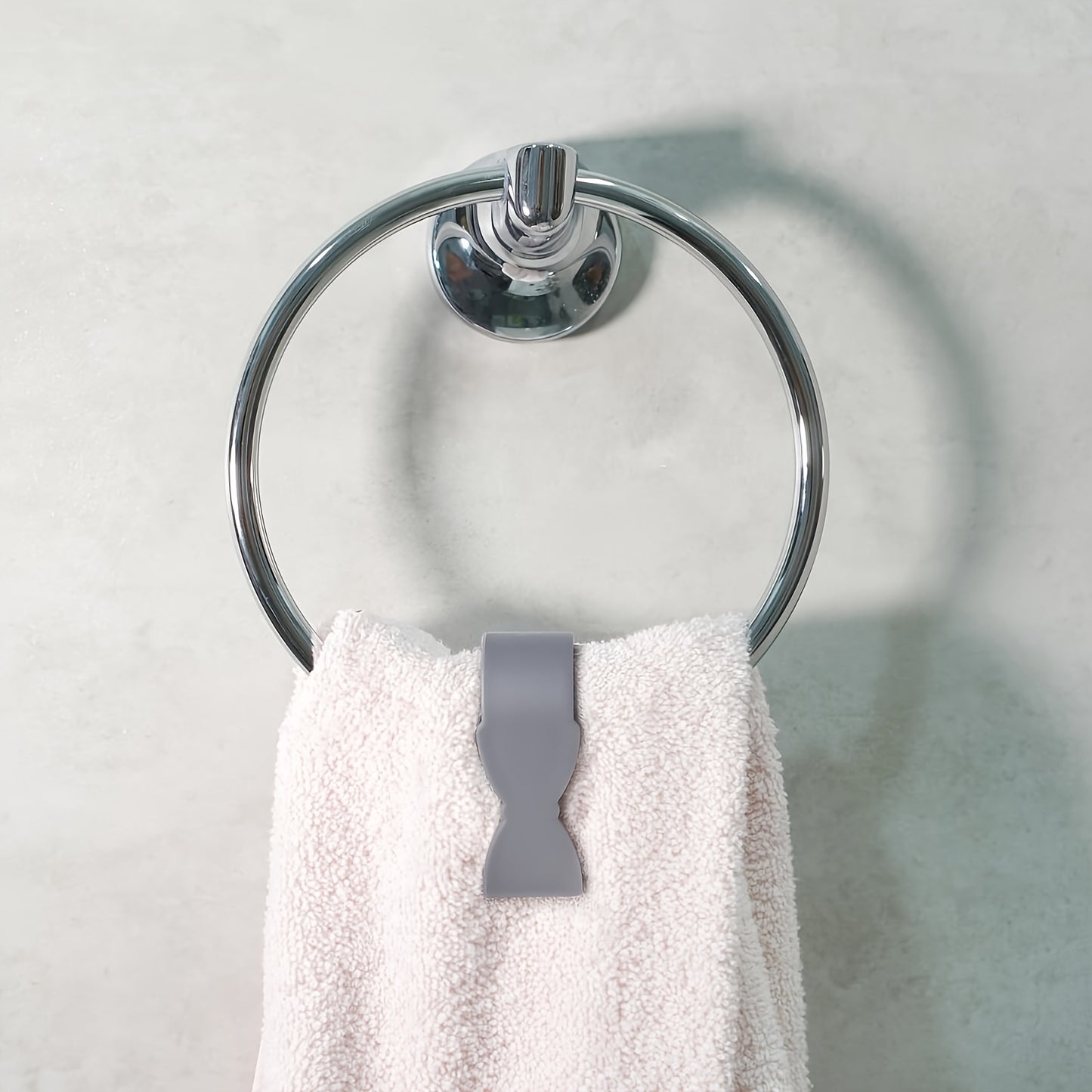 Set of 4 wall-mounted towel clips in casual style with non-slip design for multi-use in kitchen and bathroom, keeping towels secure and preventing drops.