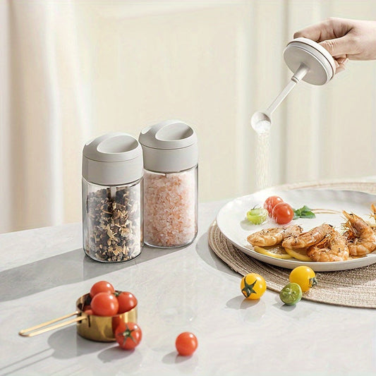 Lead-free glass condiment container with an airtight lid featuring an integrated spoon, keeps moisture out and requires no electricity. Includes a kitchen organizer for home use.