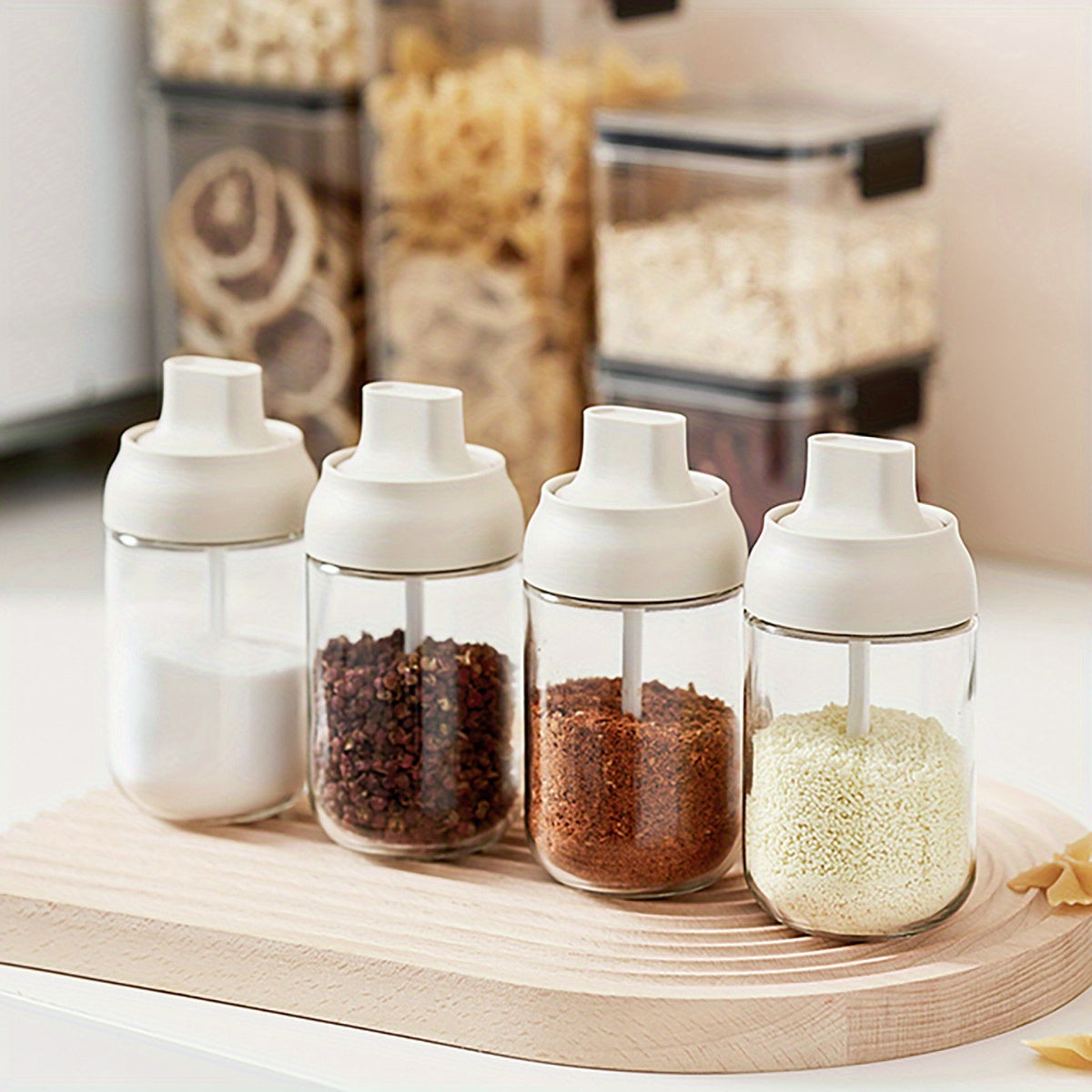 Lead-free glass condiment container with an airtight lid featuring an integrated spoon, keeps moisture out and requires no electricity. Includes a kitchen organizer for home use.