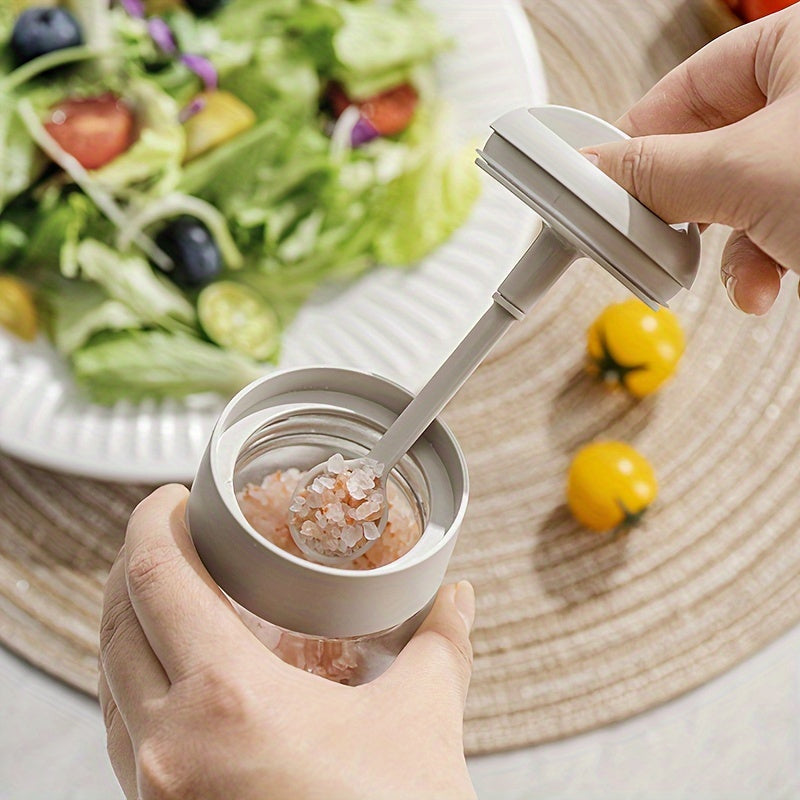 Lead-free glass condiment container with an airtight lid featuring an integrated spoon, keeps moisture out and requires no electricity. Includes a kitchen organizer for home use.