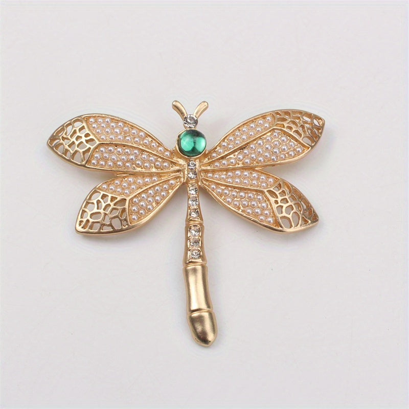 Add a touch of vintage charm with this exquisite Golden Dragonfly Brooch, crafted from luxurious alloy and enamel. Perfect for embellishing dresses, sweaters, and suits with a retro flair. This elegant accessory features a stunning golden dragonfly