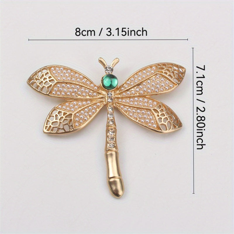 Add a touch of vintage charm with this exquisite Golden Dragonfly Brooch, crafted from luxurious alloy and enamel. Perfect for embellishing dresses, sweaters, and suits with a retro flair. This elegant accessory features a stunning golden dragonfly