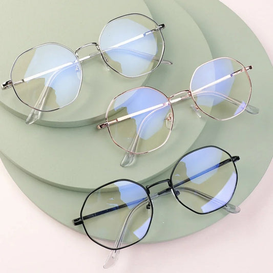 Anti-blue light glasses for women with Korean fashion vintage design, ultra-light metal frame, coconut round decoration, and protective cover for eye fatigue protection.