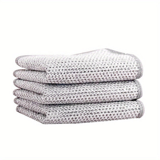 The kitchen stove cleaning cloth is crafted from silver wire, while the steel wire dishwashing cloth is oil-proof and ideal for removing oil and dirt. These cloths are part of the Golden Wire and Silver Wire cleaning cloth collection.