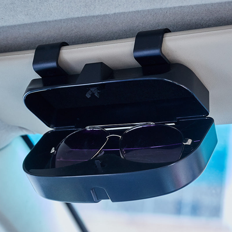 Universal Car Sun Visor Glasses Holder made of durable ABS resin with buckle mount, multifunctional interior accessory.