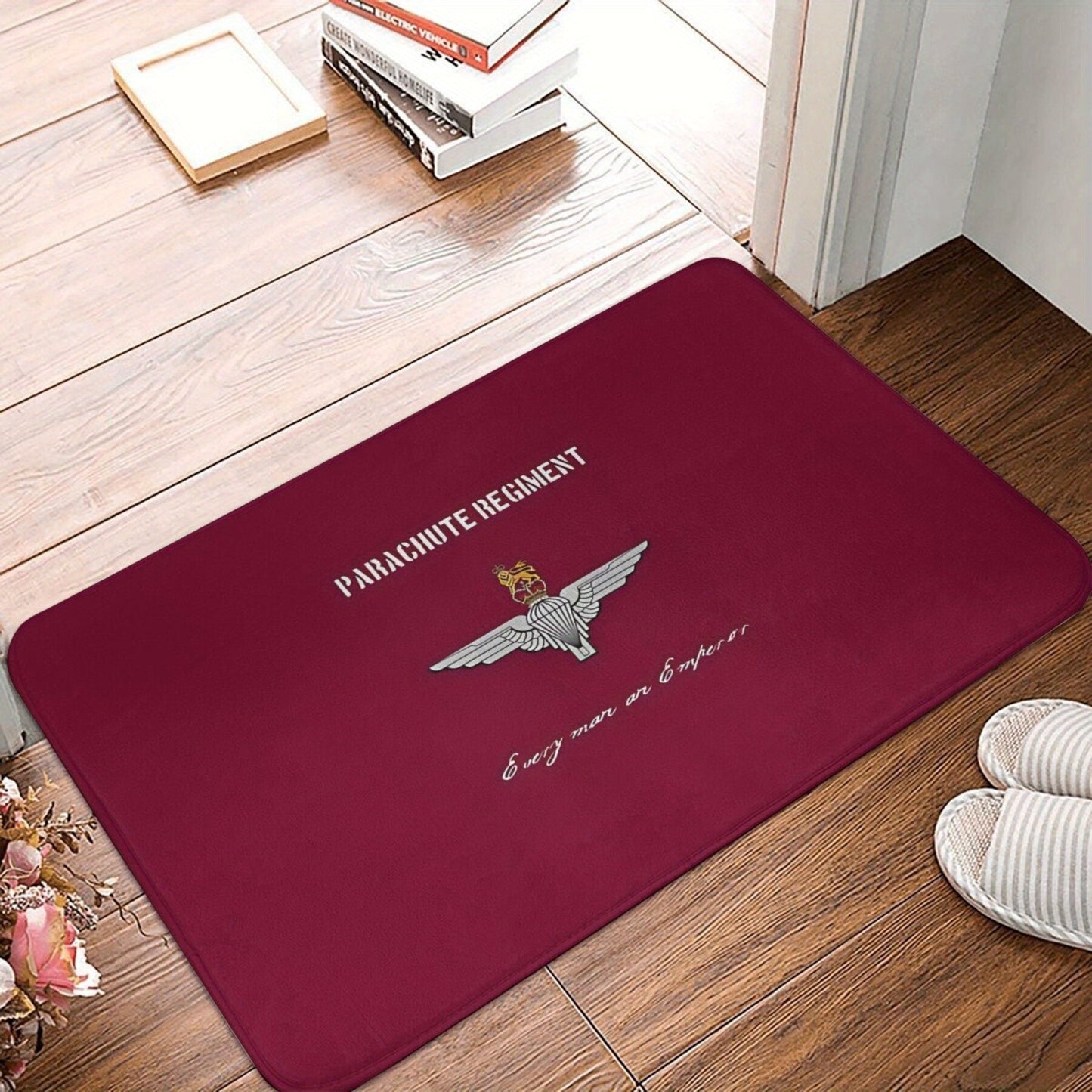 Machine-washable polyester doormat featuring a Parachute Regiment emblem. This lightweight, non-slip rectangle entrance mat is perfect for indoor or outdoor use in the kitchen, balcony, or entryway.