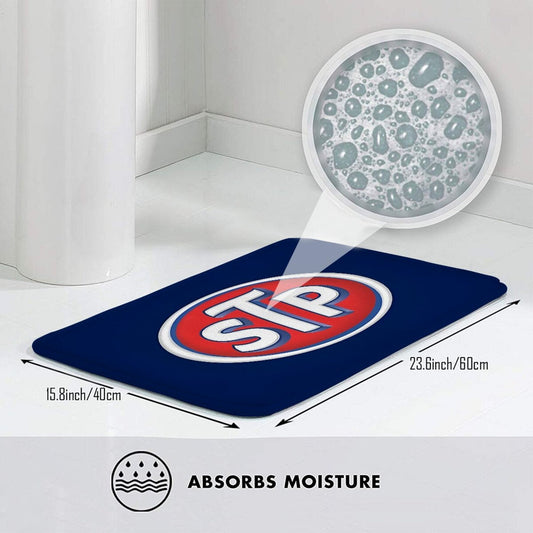 STP Logo Doormat - This lightweight, machine washable, non-slip polyester welcome mat is perfect for use in the kitchen, bedroom, or entryway. This rectangle-shaped, machine-made rug is a stylish and practical addition to any home.