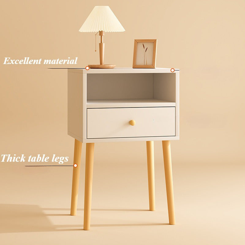 Stylish minimal bedside table with lockable storage shelf and solid wood legs for bedroom.