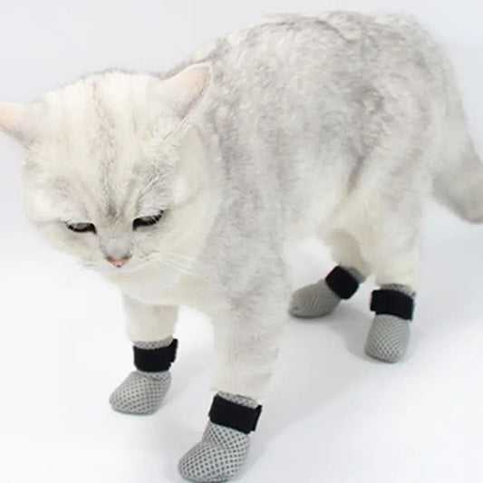 Non-slip cat socks with hook and loop fastener for small to medium cats.