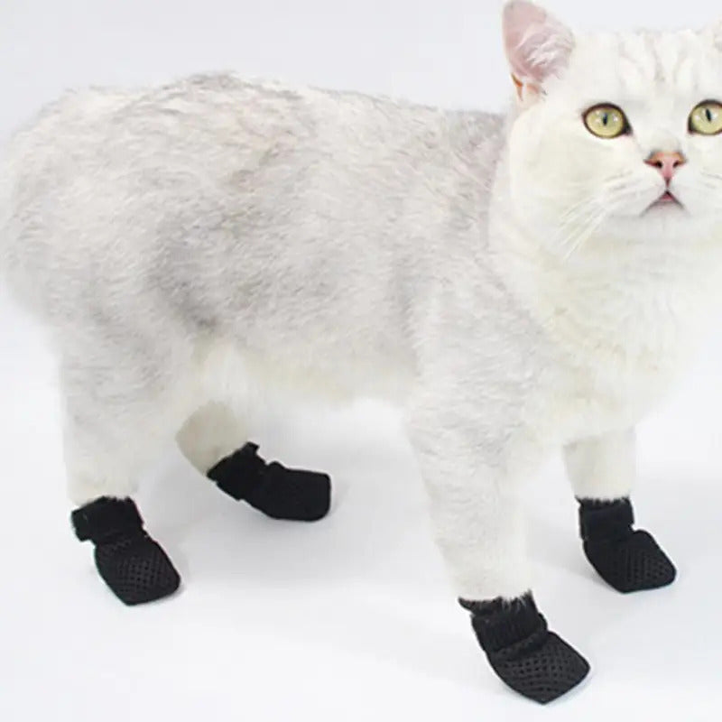 Non-slip cat socks with hook and loop fastener for small to medium cats.