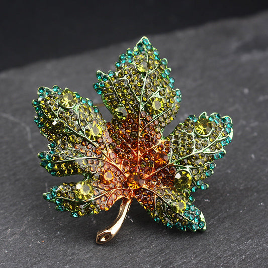 Brooch featuring a vintage-style rhinestone maple leaf design, crafted from alloy with an irregular shape and adorned with full diamond accents for a luxurious aesthetic.