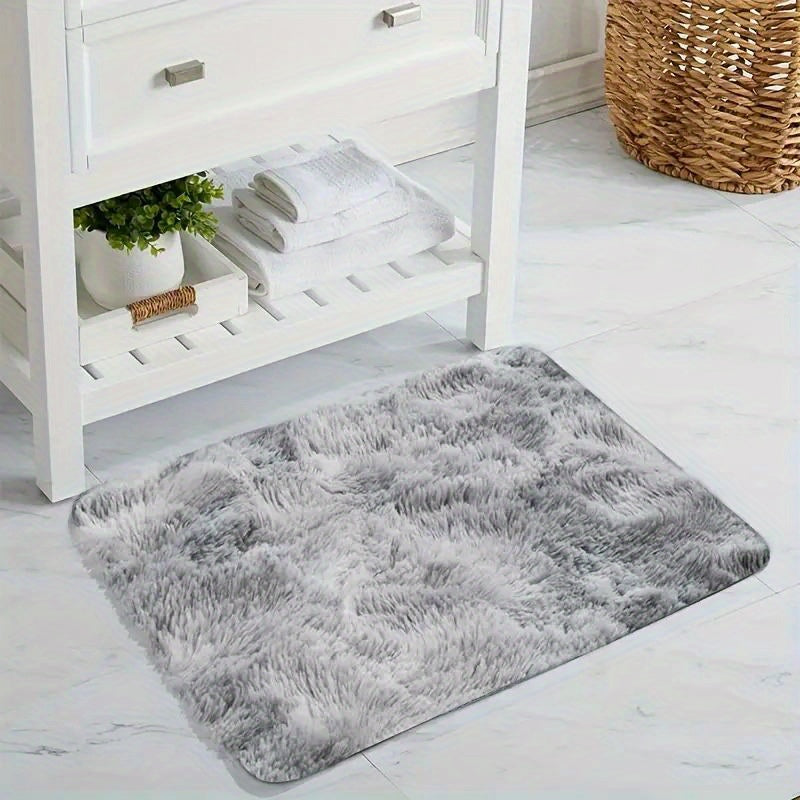 Soft and cozy gray tie-dye plush rug for living room and bedroom decor, providing fluffy shaggy comfort. Non-slip and stain resistant, ideal for home decoration.