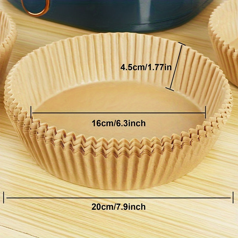 Air fryer parchment paper liners that are non-stick, come in packs of 100 or 50, and measure 16.0 cm each.