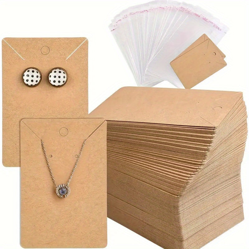 100 DIY handmade jewelry packaging bags for small accessories, keychains, earrings, headbands, and pendants. Includes necklace display stand card and self-adhesive packaging cards. Ideal