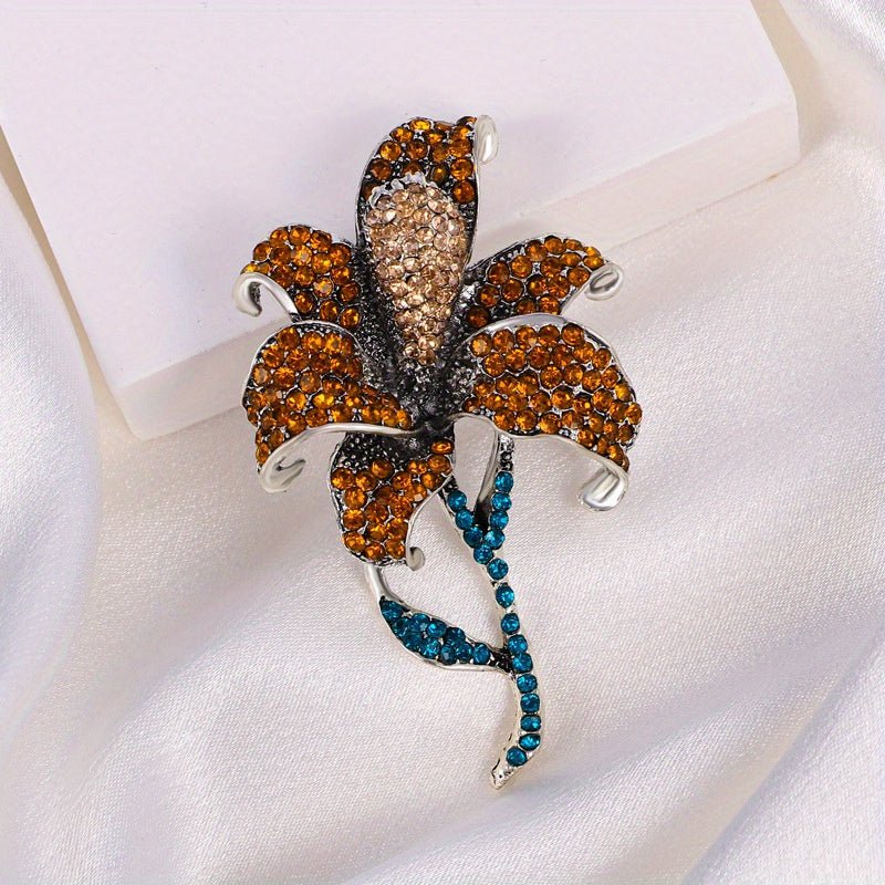 This elegant and fashionable Vintage Lily Flower Rhinestone Brooch is a luxurious piece of flower jewelry that complements any outfit. Versatile and neutral, it pairs well with different clothing styles and is perfect for weddings and formal occasions.