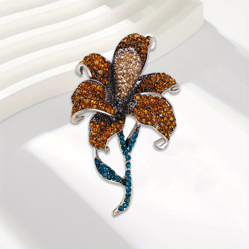 This elegant and fashionable Vintage Lily Flower Rhinestone Brooch is a luxurious piece of flower jewelry that complements any outfit. Versatile and neutral, it pairs well with different clothing styles and is perfect for weddings and formal occasions.