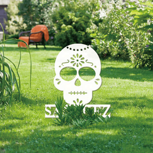 Customized Iron Sugar Skull Wall Art for Day of the Dead celebration. This glamorous metal sign is perfect for decorating your porch in a style that pays homage to Día de Muertos. Personalize this candy skull metal decor for Halloween without the need