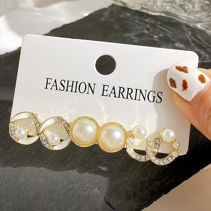 Luxury earrings set with moon, bowknot, and mermaid tail designs. Made of imitation pearl and zinc alloy, versatile for daily and party wear.