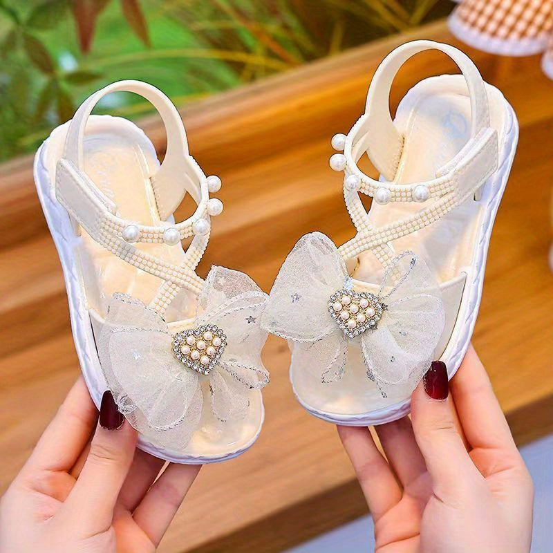 New summer girls' sandals for 2024 with anti-slip soft bottom, perfect for medium and large children. Ideal for little girls and baby princesses at the beach.