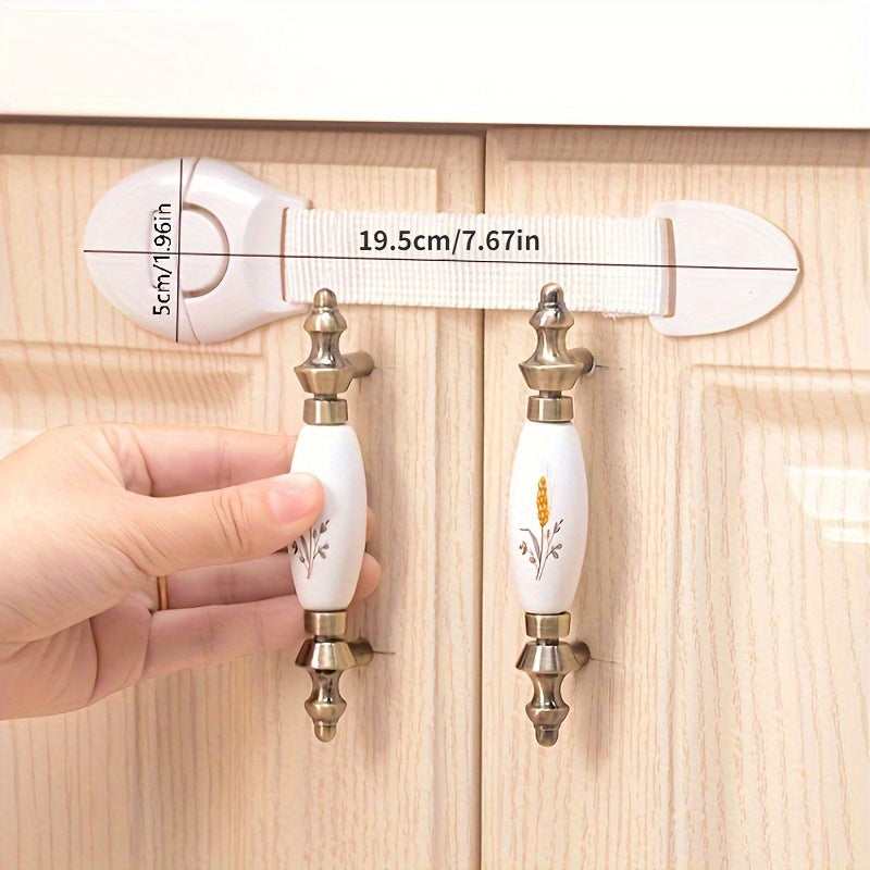 A set of 10 white plastic safety cabinet locks with adjustable childproofing straps, easy installation, tamper-resistant design, lead-free materials, suitable for securing drawers and doors for home security.