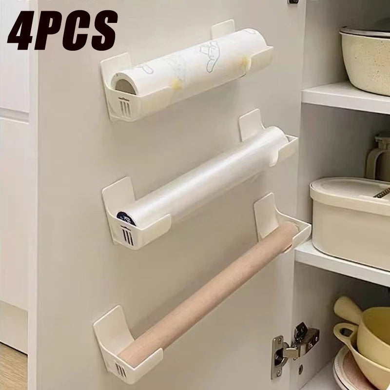 Wall-mounted storage organizer that saves space and holds plastic wrap and garbage bags without the need for drilling. Made of durable plastic, it is perfect for storing items on the side of the refrigerator.