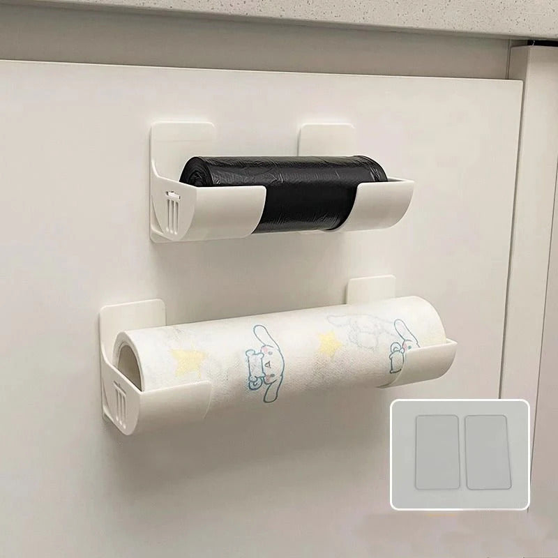 Wall-mounted storage organizer that saves space and holds plastic wrap and garbage bags without the need for drilling. Made of durable plastic, it is perfect for storing items on the side of the refrigerator.