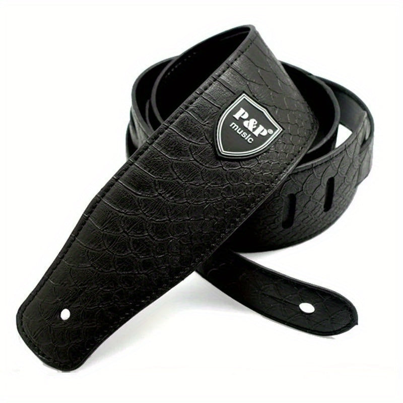 Wide 6.35 cm faux leather electric guitar strap with adjustable soft embroidering in various colors.