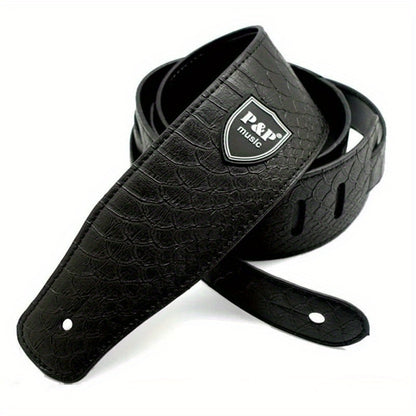 Wide 6.35 cm faux leather electric guitar strap with adjustable soft embroidering in various colors.