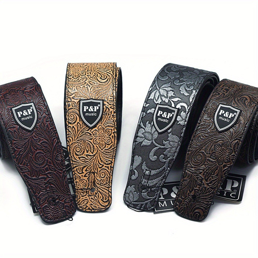 Wide 6.35 cm faux leather electric guitar strap with adjustable soft embroidering in various colors.