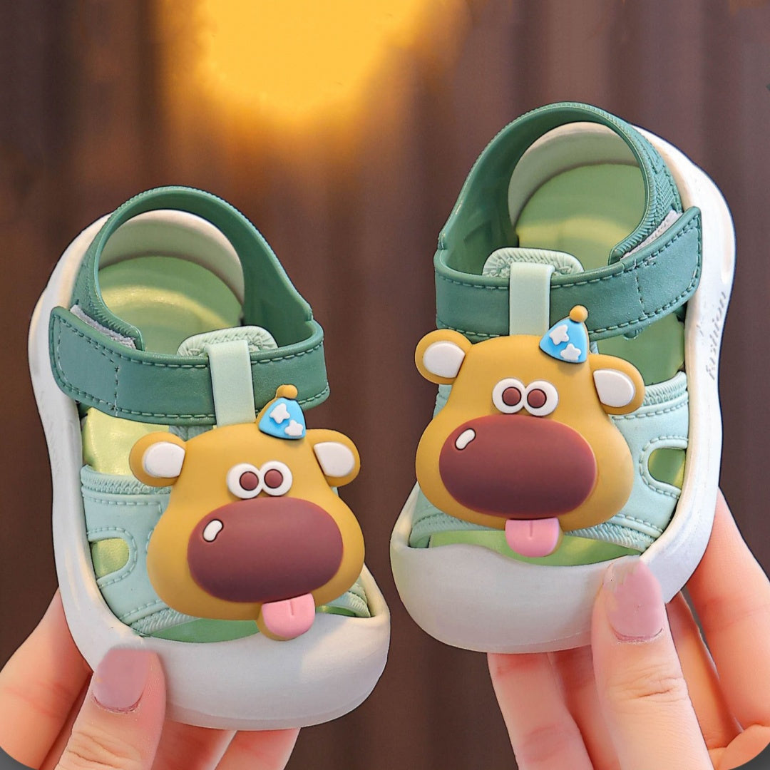 Baby boy's cute cartoon animal sandals with hook and loop fastener for outdoor summer wear.