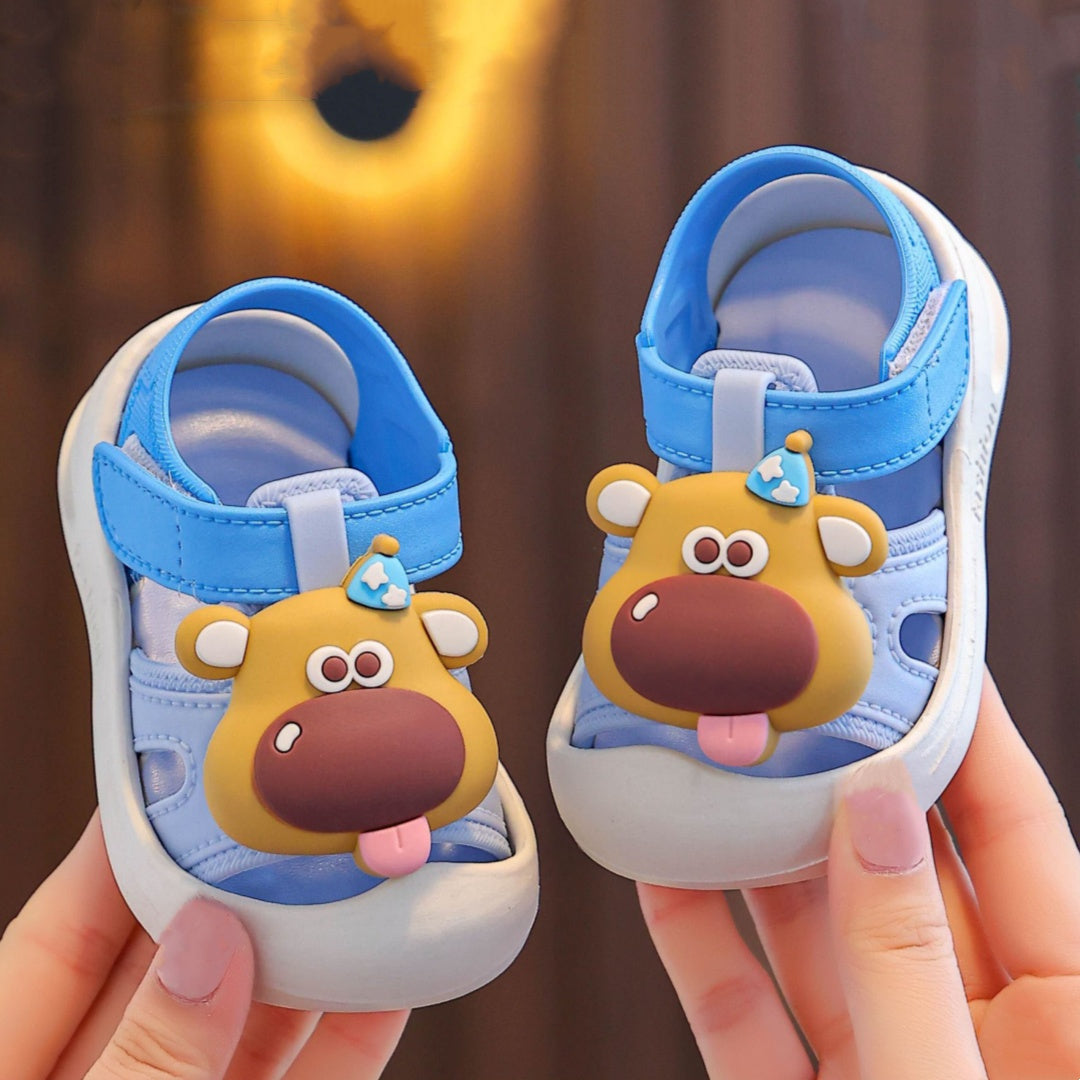 Baby boy's cute cartoon animal sandals with hook and loop fastener for outdoor summer wear.