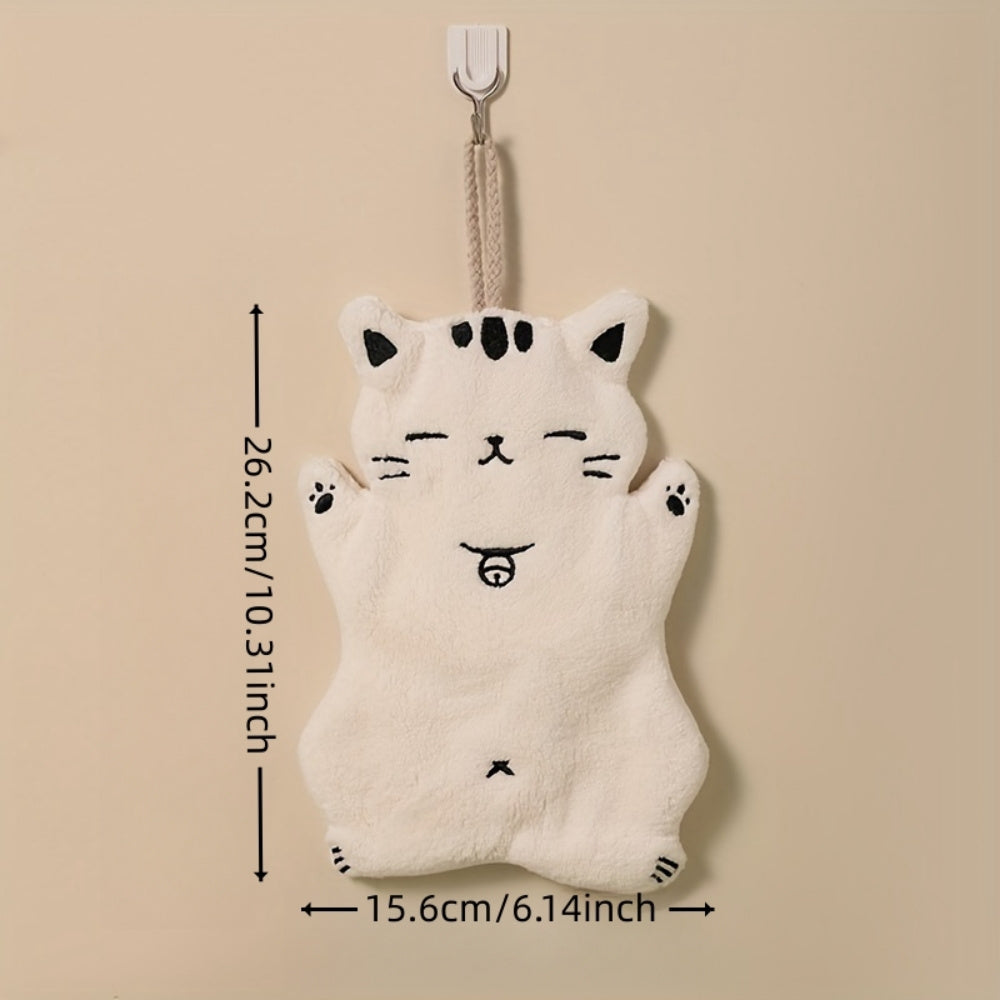 Cute cat-shaped hand towel made of soft coral fleece material with quick-dry feature, suitable for use in bathroom and kitchen with its hanging design.