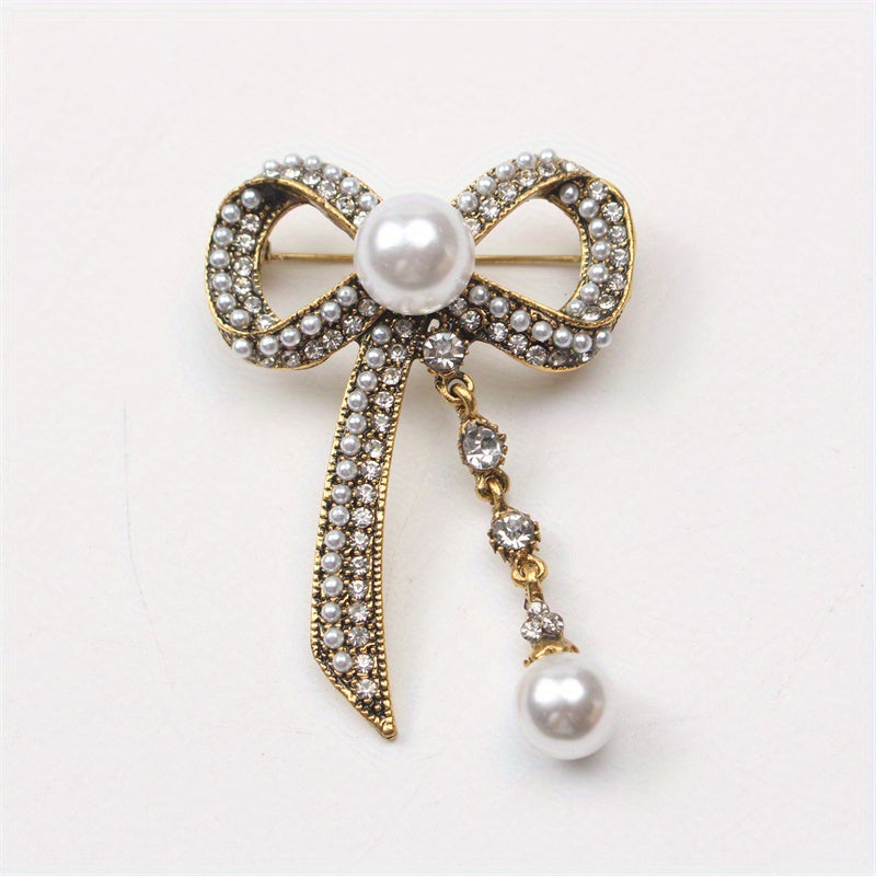 Luxurious Vintage-Inspired Bow Brooch Pin with Rhinestones and Pearl Dangle - Elegant Alloy Bowtie Lapel Pin for Women's Fashion Statement