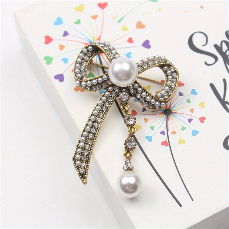 Luxurious Vintage-Inspired Bow Brooch Pin with Rhinestones and Pearl Dangle - Elegant Alloy Bowtie Lapel Pin for Women's Fashion Statement