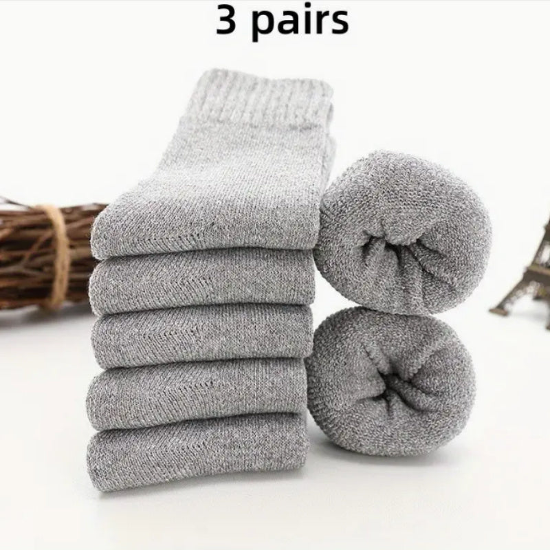 3 or 5 pairs of men's thick warm terry crew socks in solid colors for winter