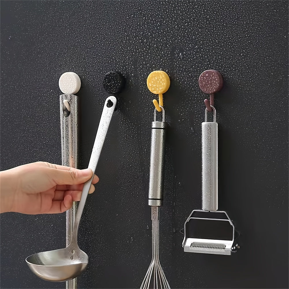 10 self-adhesive hooks for various uses, such as keys, coats, towels, and home decor. Perfect for bathroom, bedroom, and entrance doors.