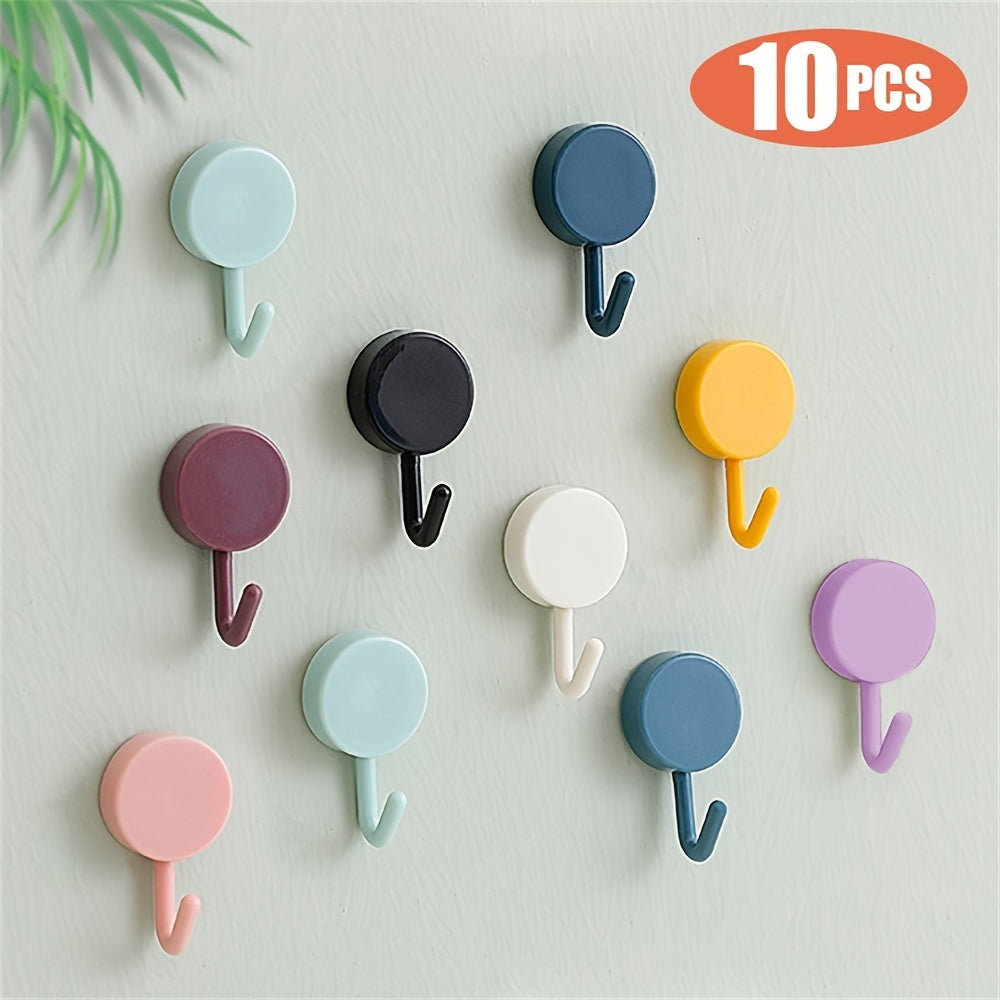 10 self-adhesive hooks for various uses, such as keys, coats, towels, and home decor. Perfect for bathroom, bedroom, and entrance doors.