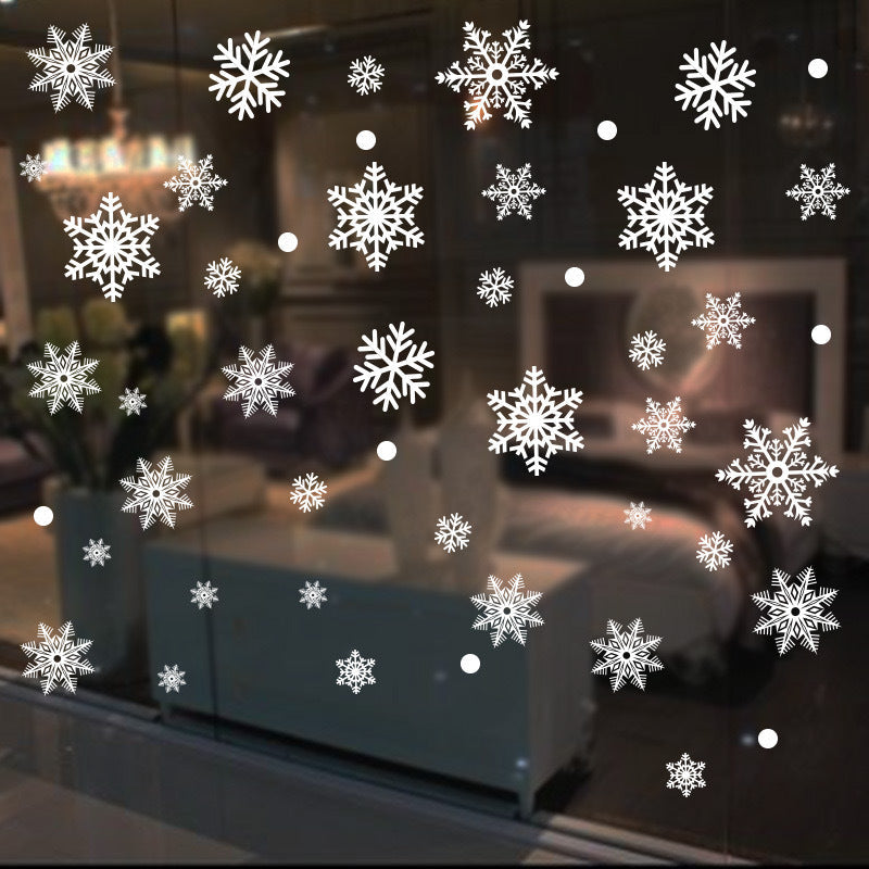 These Christmas Window Decals include 80 removable static cling snowflake stickers in white, perfect for holiday glass decor. They require no electricity or feathers to adhere.