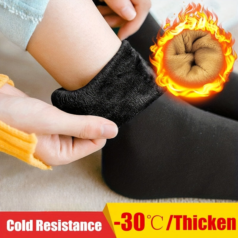 4 pairs of polyester thermal socks with fleece lining in solid black, machine washable, medium tube for cold resistance.