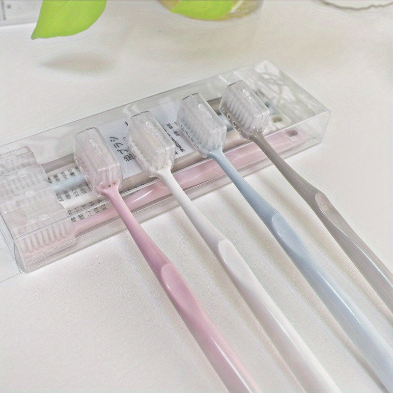 4 Japanese macaron-colored toothbrushes with soft bristles and protective covers for portable and professional dental care for adults.