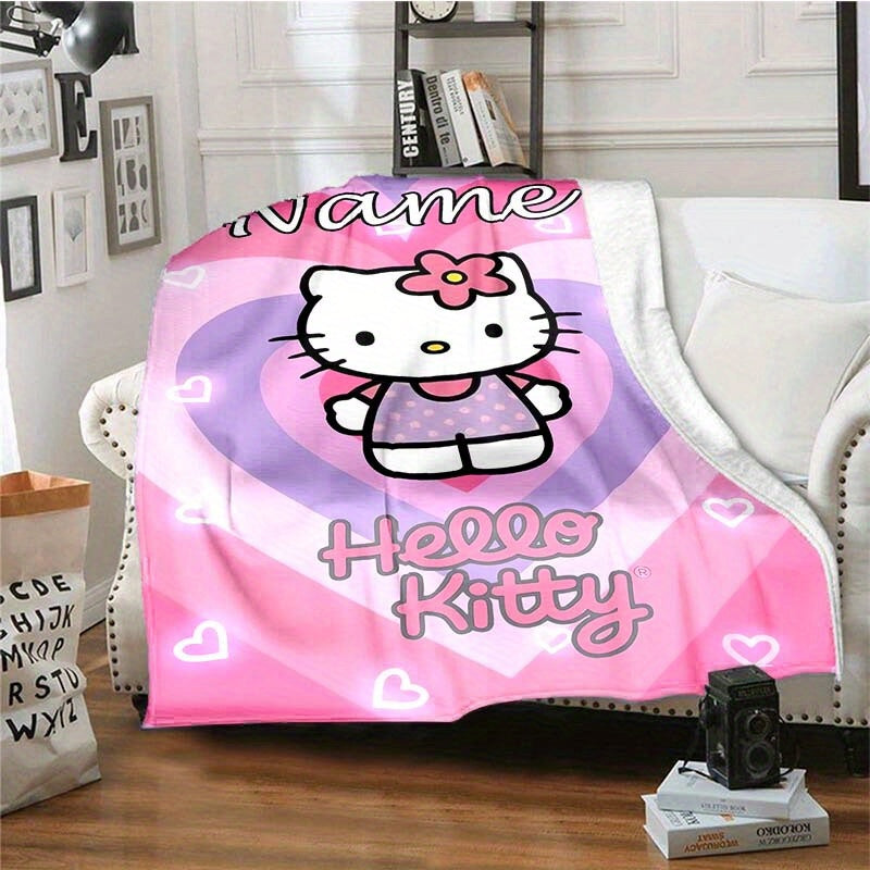 Soft and cozy all-season Hello Kitty Pink Flannel Blanket customized with your name - perfect for sofa, bed, office or camping. Makes an ideal holiday gift for any Sanrio fan.