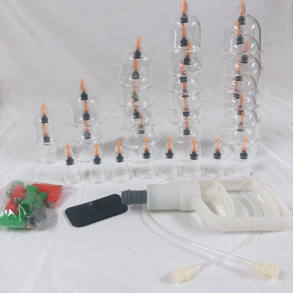 Home use vacuum cupping set with 32 suction cups.