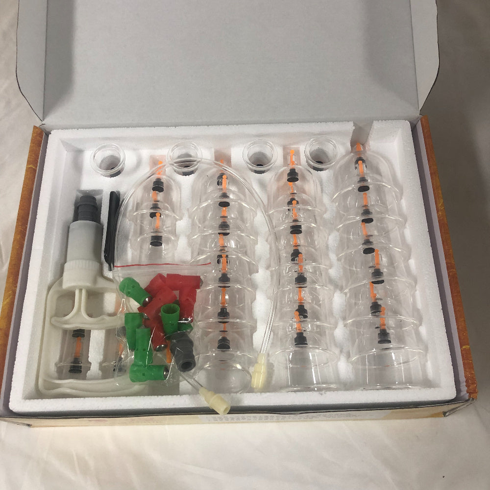 Home use vacuum cupping set with 32 suction cups.